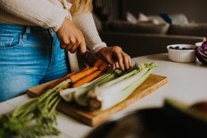 Meal Planning Health Coach | Woman Cutting Vegetables